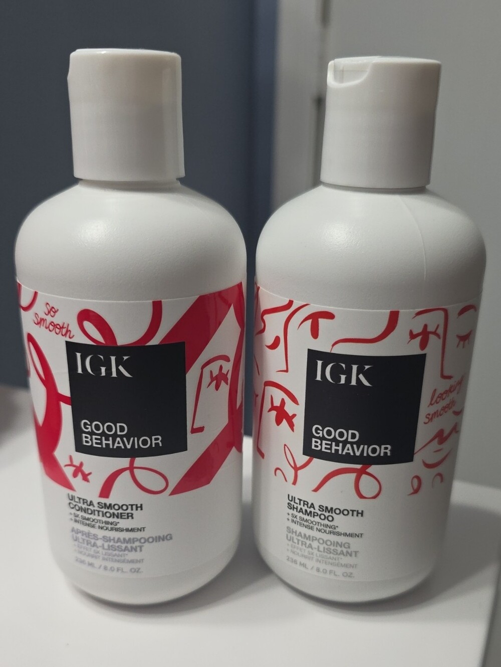 IGK Good Behavior Ultra Smooth Shampoo & Conditioner - White with Red Accents